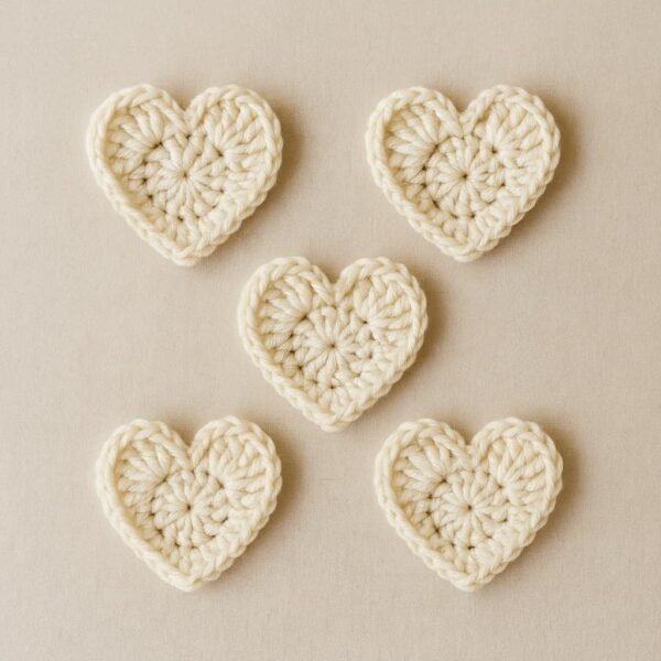 Group of five cream crochet hearts – great for bunting, home decor, or gifts
