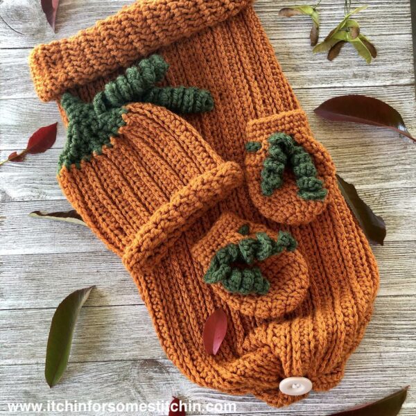 crochet pumpkin baby hat, mittens, and sleep sack by www.itchinforsomestitchin.com