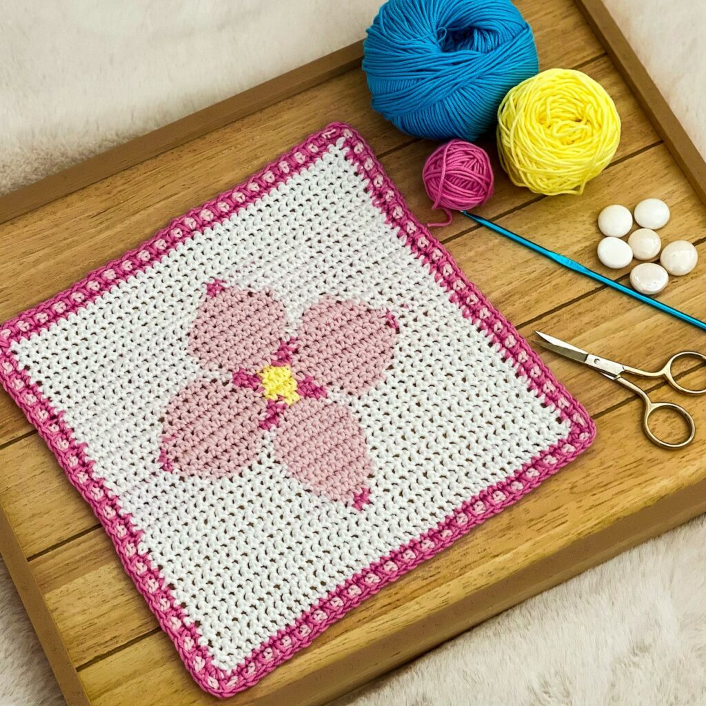 Pretty N' Pink Four Petal Tapestry Crochet 10-inch Square Pattern with Pink Trim