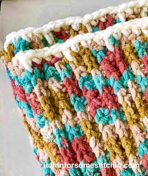 Spike Stitch Edging on a multicolor chunky crochet blanket